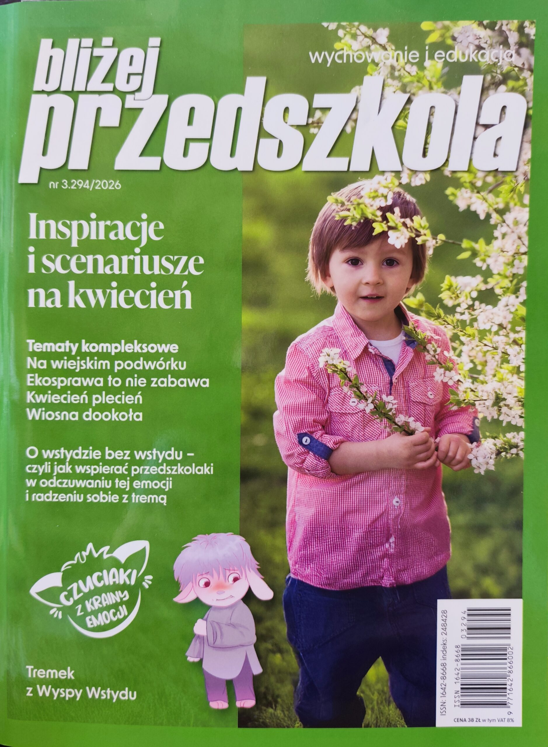 Na okładce około trzyletni chłopiec ubrany w koszulę z długim rękawem w biało-czerwoną drobną kratkę i jeansowe spodnie. Chłopiec stoi obok kwitnącej jabłoni i trzyma w dłoniach jedną z gałązek drzewa.