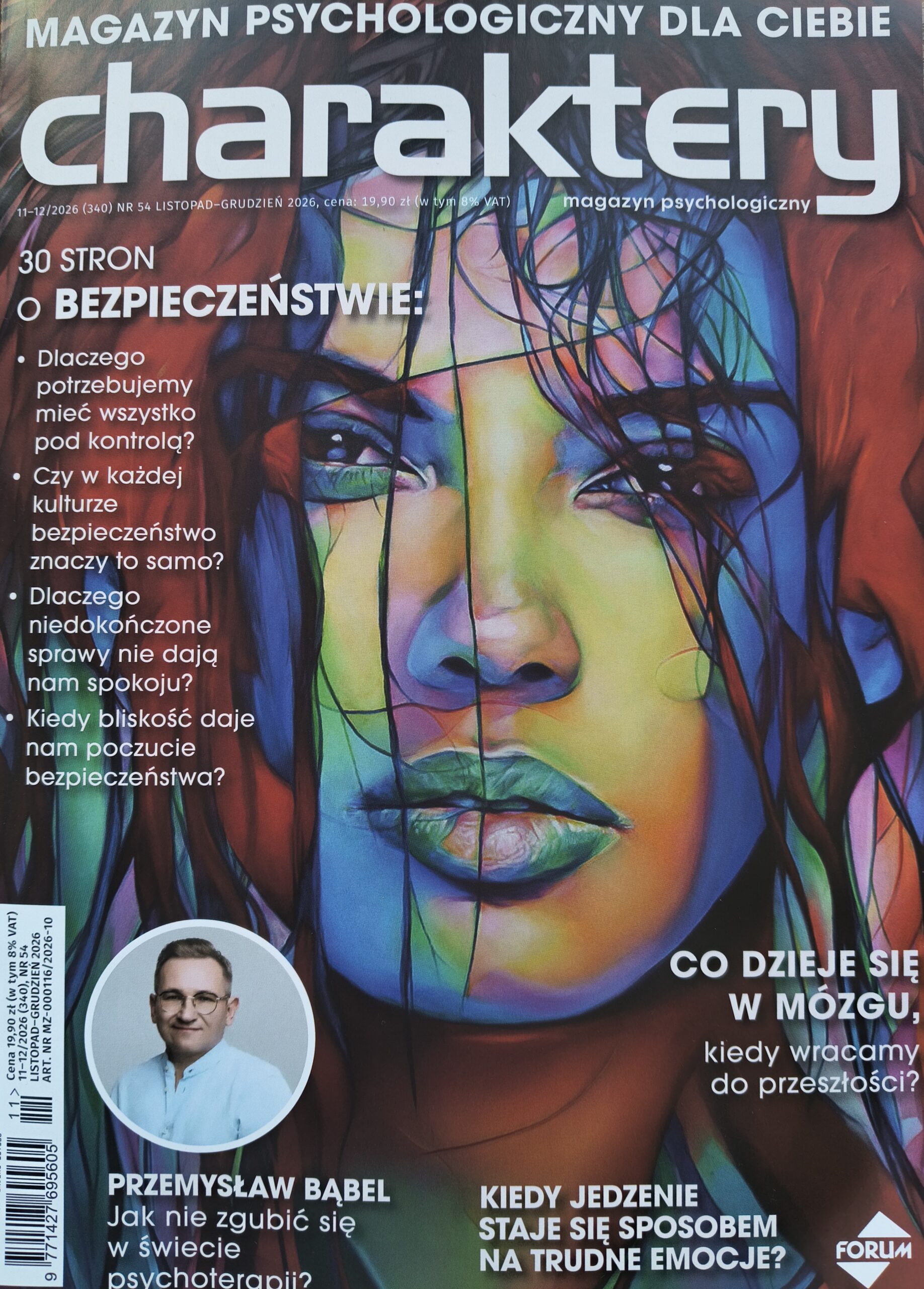 Okładka czasopisma "Charaktery" z napisami wokół grafiki z kolorową twarzą kobiety.